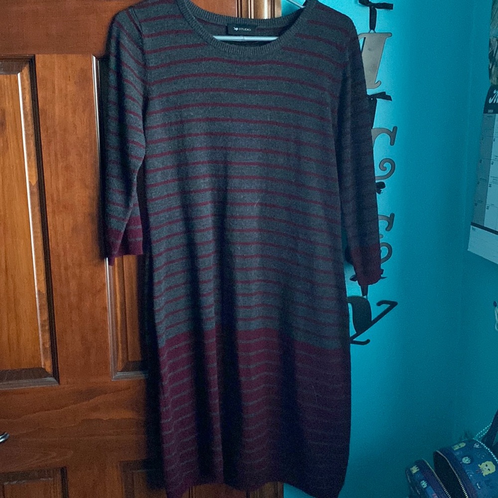 Medium length dark grey dress with red stripes